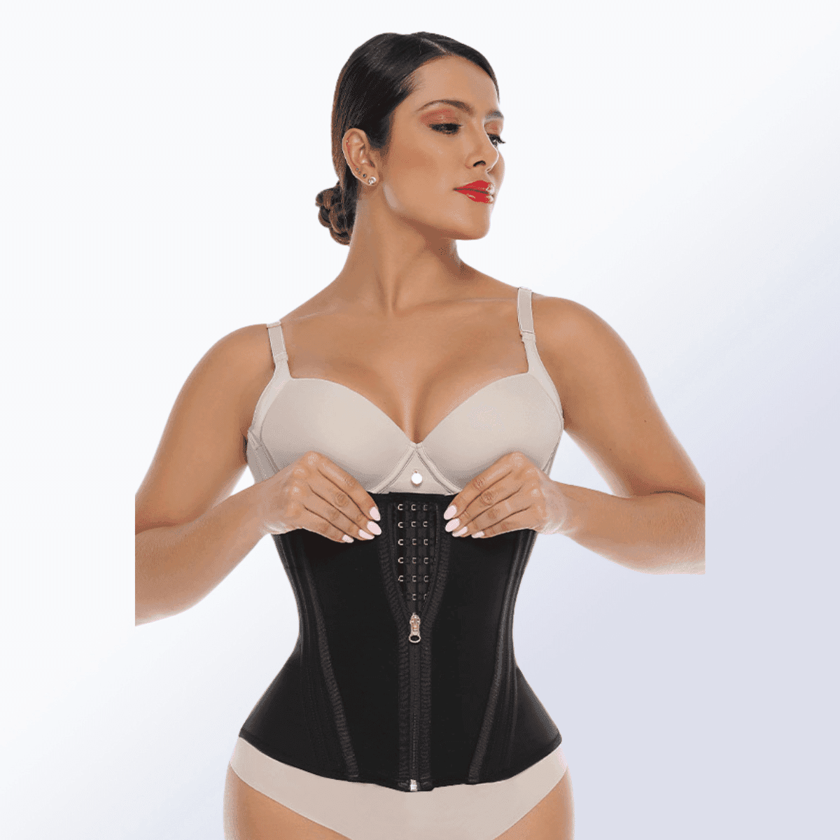 Shapewear for tummy control smoothing the midsection under a fitted dress